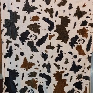 Cow print blanket. 50x40
